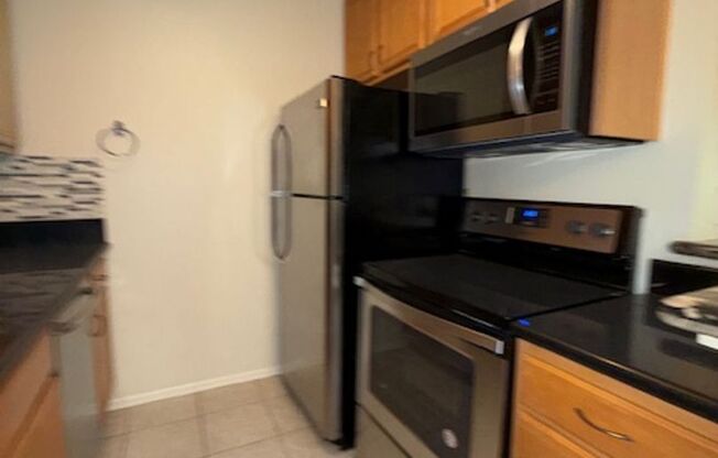 Top floor, 1 Bedroom, 1 Bath Condo in Stoney Brook Villas with 2 Parking ($300 of the first 3 Months)