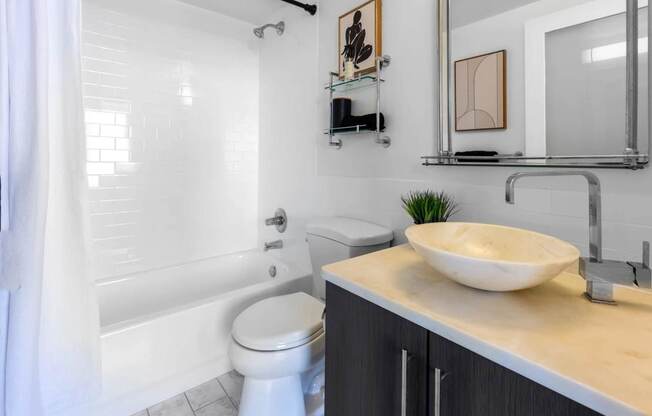a bathroom with a sink and a toilet