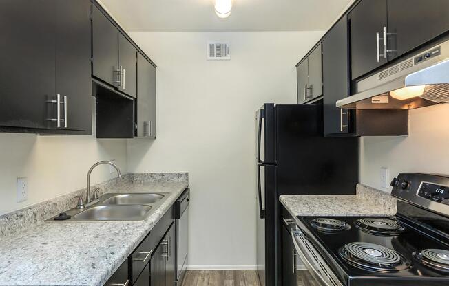 A FULLY EQUIPPED KITCHEN WITH DISHWASHER