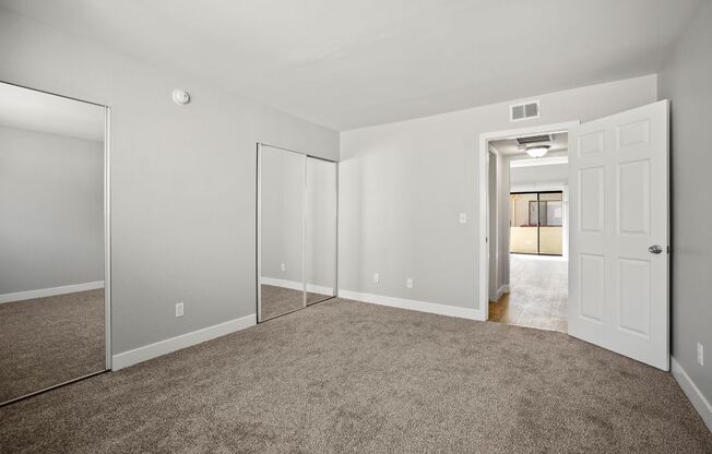 Master Bedroom Sherman Oaks Apartment with Mirrored Closet