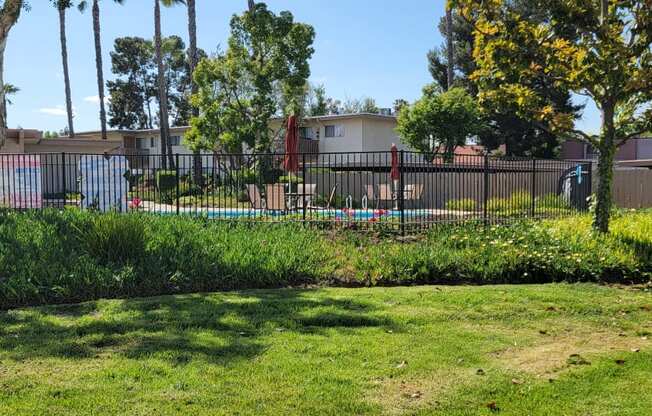 Beauty surrounds the pool and sun deck at Plaza Verde Apartments in Escondido, California.