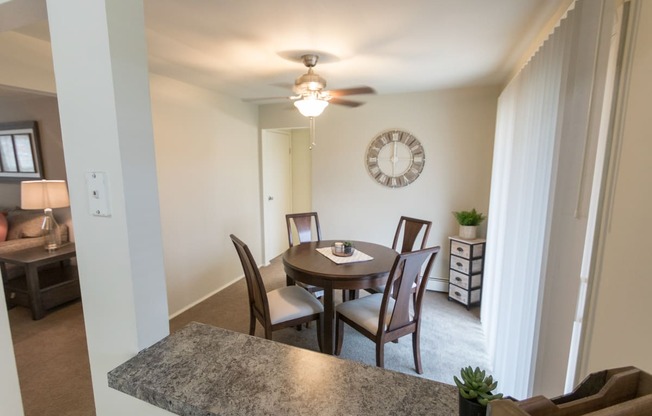 This is a photo of the dining room of the 1 bedroom, 631 square foot model apartment at Lake of the Woods Apartments in Cincinnati, OH.