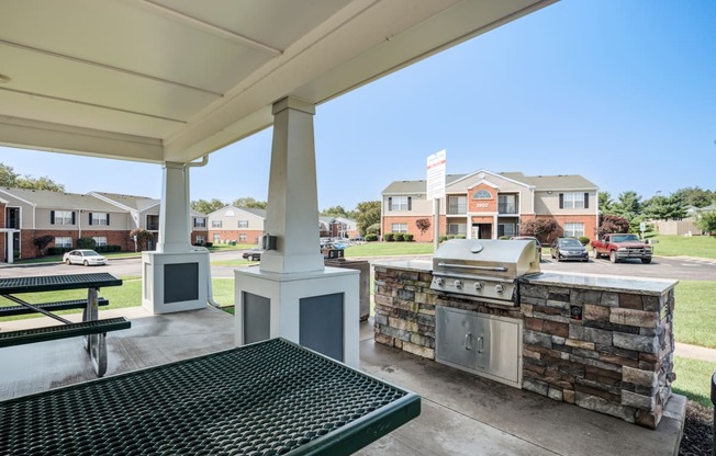 the preserve at ballantyne commons spacious covered patio with grill and table