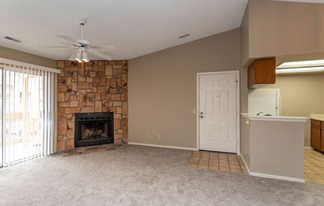 Cozy 2-Bed Condo with Fireplace, Garage & Pool Access Near Shopping!