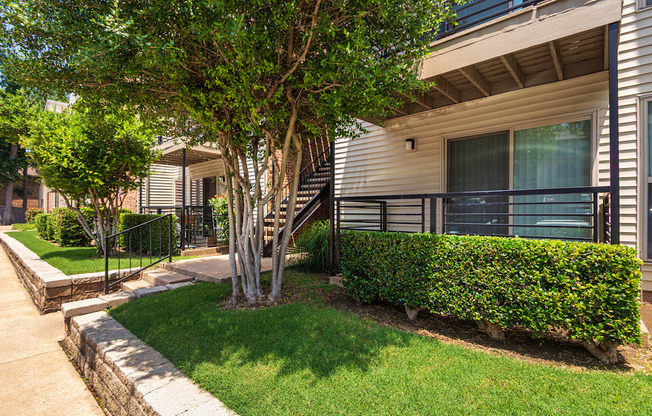 Apartment building exterior at Canyon Creek Apartments in the Dallas Midtown neighborhood of Dallas, TX.