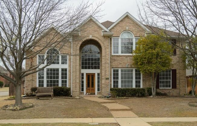 Escape to your own private resort at 2613 Owl Creek Drive in Plano—a grand 4-bedroom executive home featuring soaring cathedral ceilings, a dedicated home office, a massive game room, top-rated Plano ISD schools, and a dream backyard oasis complete with a