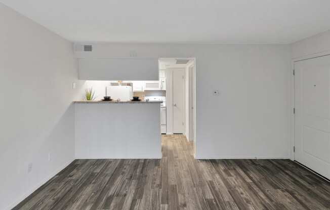 This is a photo of the living room in the 477 square foot 1 bedroom apartment at Canyon Creek Apartments in Dallas, TX.