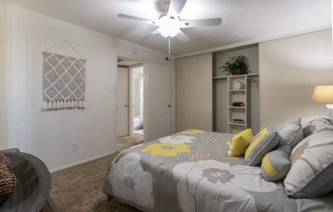This is a photo of the bedroom of the 590 square foot 1 bedroom, 1 bath model apartment at The Biltmore Apartments located int he Vickery Meadow neighborhood of Dallas, TX.