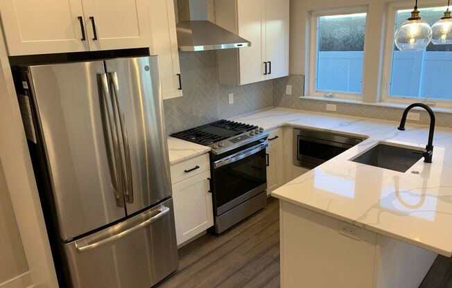 Incredible 4-Bedroom Townhouse in the Heart of Brewerytown! One-Car Garage Included!