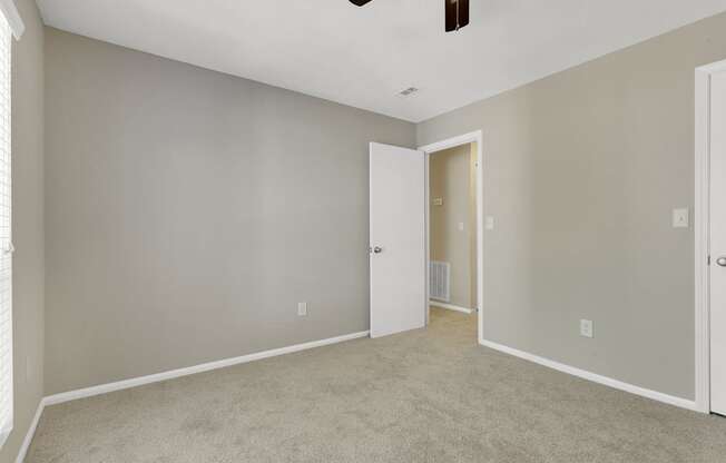 Spacious Bedroom with Plush Carpeting