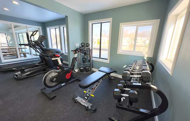 Weights and exercise machines at old farm shores