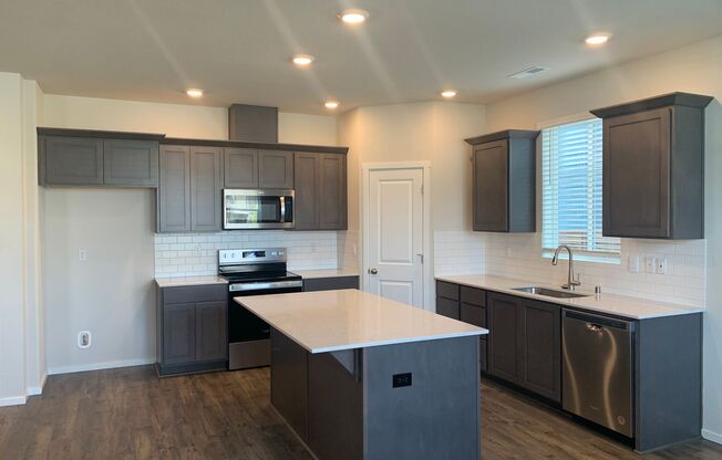 BRAND NEW 4 BED/2.5 BATH HOME! MOVE IN NOW! High End Finishes!  Beautiful Kitchen!