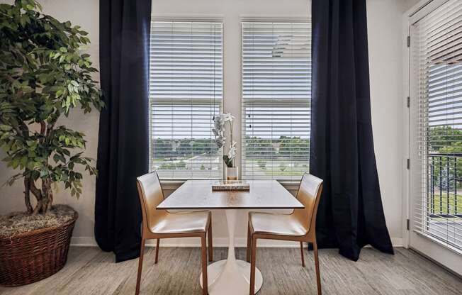 Dining room with lots of natural light - Enclave at Cherry Creek