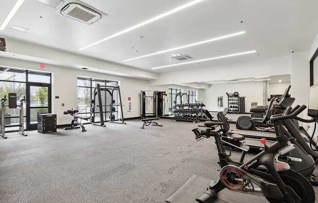A spacious gym with a variety of exercise equipment.
