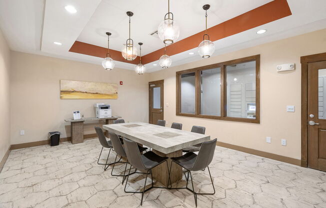 a dining room with a table and chairs at Lakeline East Apartments, Texas, 78613