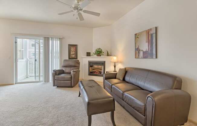 Model Living Room with Fireplace at The Madison Apartments in Olympia, WA, 98513