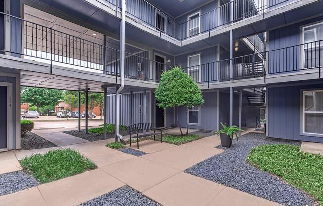a bench in front of a building