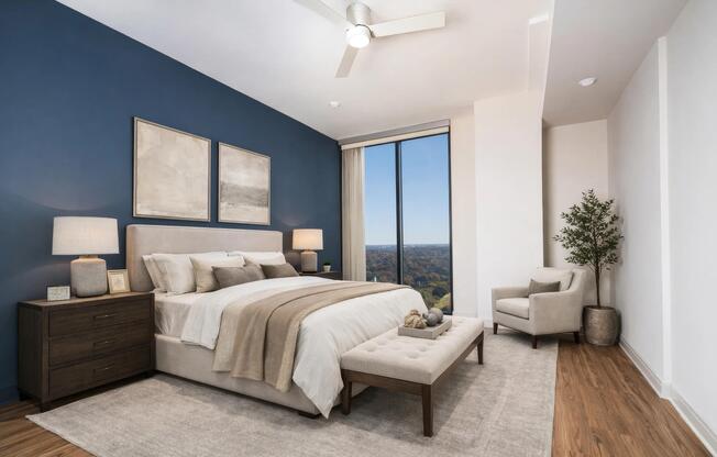 Penthouse bedrooms offer expansive layouts, floor-to-ceiling windows, and calming finishes that frame skyline views.