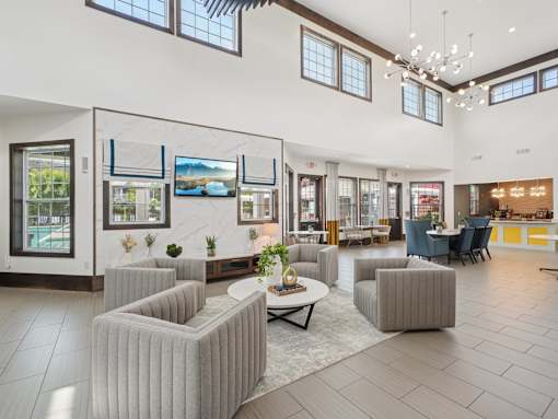 Luxury resident clubhouse and community lounge at Village at Broadstone Station apartments in Apex, NC