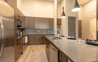 Kitchen with Stainless Steel Appliances and Quartz Countertops