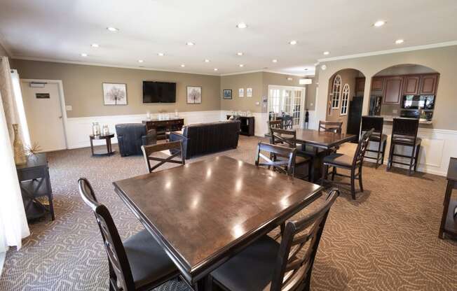 Clubhouse interior with entertainment area and a kitchen at Archers Pointe.