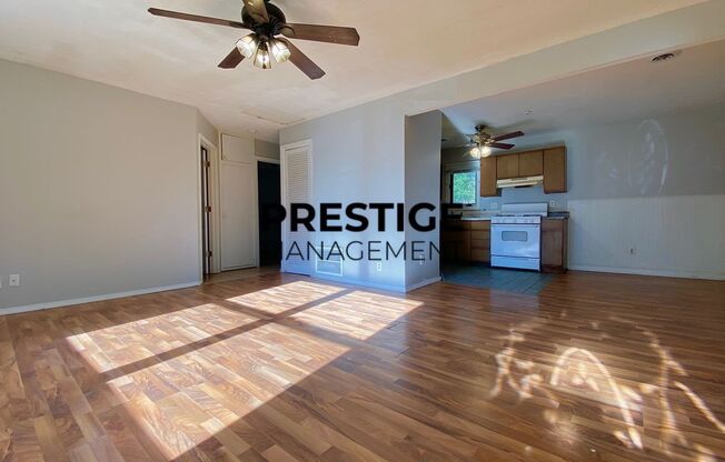 3 Bedroom • 1 Bathroom; open concept complete with kitchen, dining, & living space