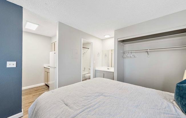 Experience the comfort of this modern bedroom, perfectly blending functionality and style.