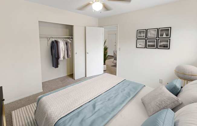 This is a photo of the digitally staged second bedroom of a 742 square foot, 2 bedroom apartment at Romaine Court Apartments in the Oakley neighborhood of Cincinnati, Ohio.