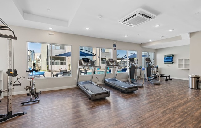 the gym at the enclave at woodbridge apartments in sugar land, tx at Loma Villas Apartments, San Bernardino, 92408