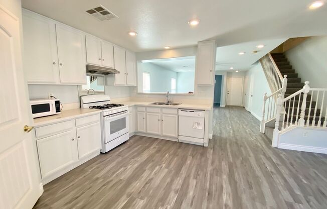 2 story home located in the community of Villas at Desert Breeze! 4 bedrooms 3 total bath located on Durango and Desert Inn. Hardwood flooring downstairs, easy to maintain backyard