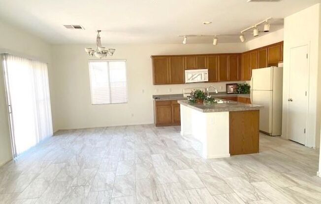 Gated Community! Fabulous 4 Bedrooms Plus Large Loft. One Bed and Bath Downstairs.