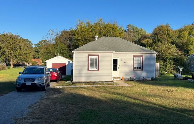 2 bed house, big .75 acre yard, hardwoods, central HVAC, laundry