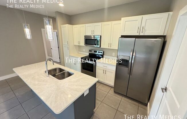 12 ZINNIA LN E