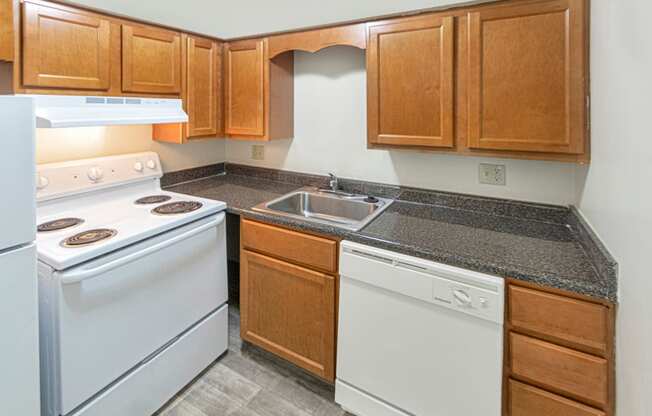 This is photo of the kitchen in the 724 square foot 2 bedroom apartment at Aspen Village Apartments in Cincinnati, OH.