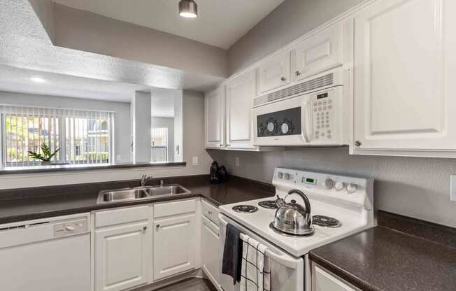 Updated white cabinets and white appliance package
