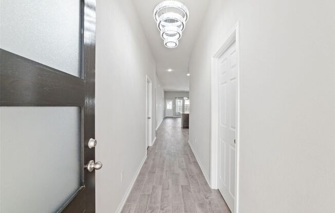 Love every moment spent in this incredible Lake Ridge Builders home in Morton Creek Ranch. Resting on a corner lot, this 3-sided brick home boasts a premium elevation, no back neighbors, wood-look tile flooring, a sprinkler system, faux wood blinds, and a