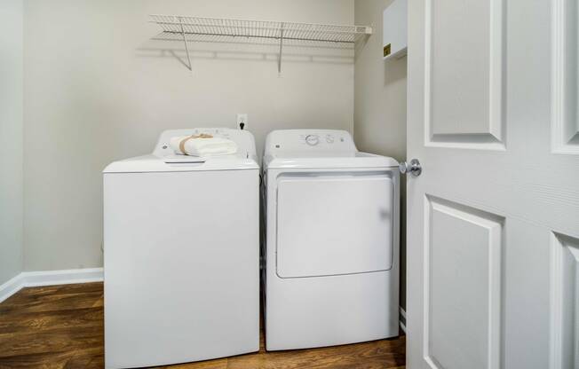 Laundry room with Washer/Dryer and Shelving