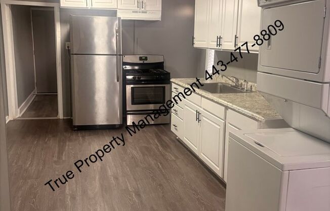 Spacious Baltimore Home with Large Backyard & Basement – 501 Streeper St