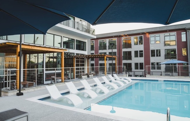 pool view with benches inside of the pool