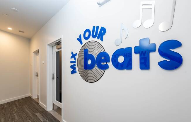 a wall with the words your beats on it