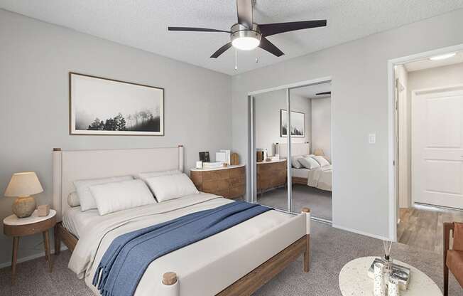 Model Bedroom with Carpet and Closet at Colonnade at Fletcher Hills Apartments in El Cajon, CA.