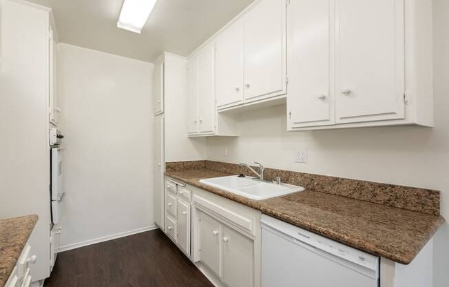 Kitchen with White Appliances and White Cabinets