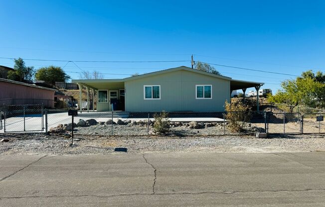 Beautifully Remodeled 4-Bedroom Home with Sunroom and Ample Parking in Bullhead City