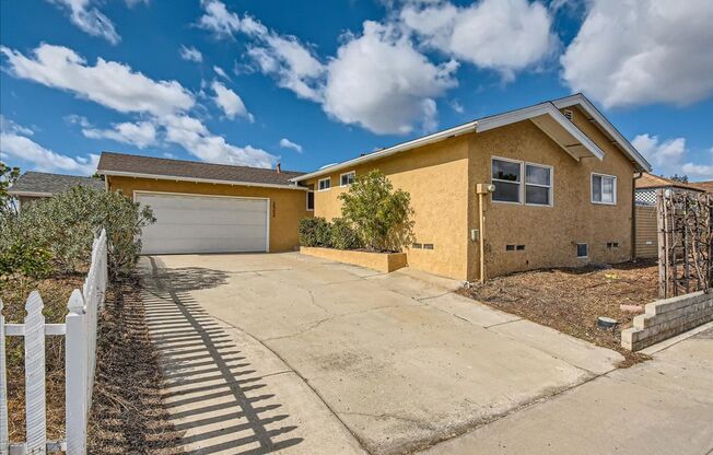 “Charming Serra Mesa Home with Sunlit Spaces, Fruitful Gardens, and Parkside Perks”