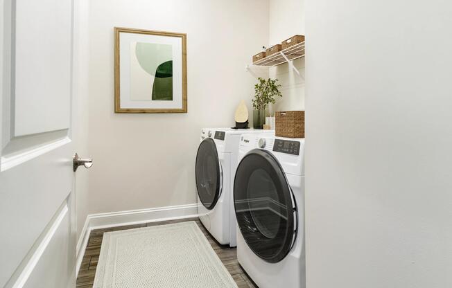 In-home laundry at Amavi Brier Creek, offering everyday convenience within a thoughtfully designed Single-Family home setting in Durham.