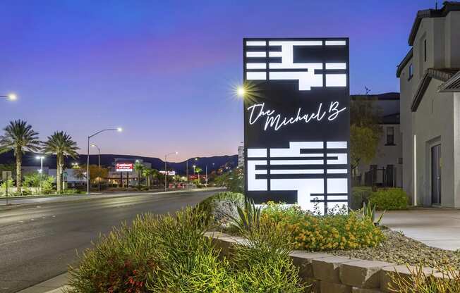 As the sun sets and the skies turn to hues of twilight, The Michael B welcomes all who pass by with its glowing lighted sign along the street.