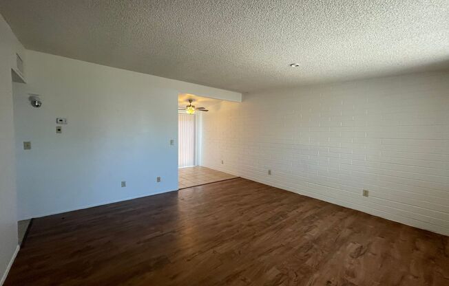 Central 2 bedroom 1 bath unit with Fenced yard.