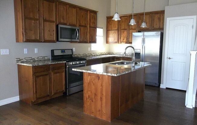 Beautiful 4-Bedroom Home with 3-Car Garage & Fenced Yard