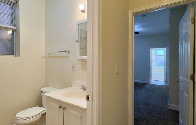 For Rent: Classic Urban Living at 2227 St Paul St – Your City Retreat Awaits!