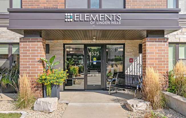 The front of a building with the name Elements of Linden Hills on it.